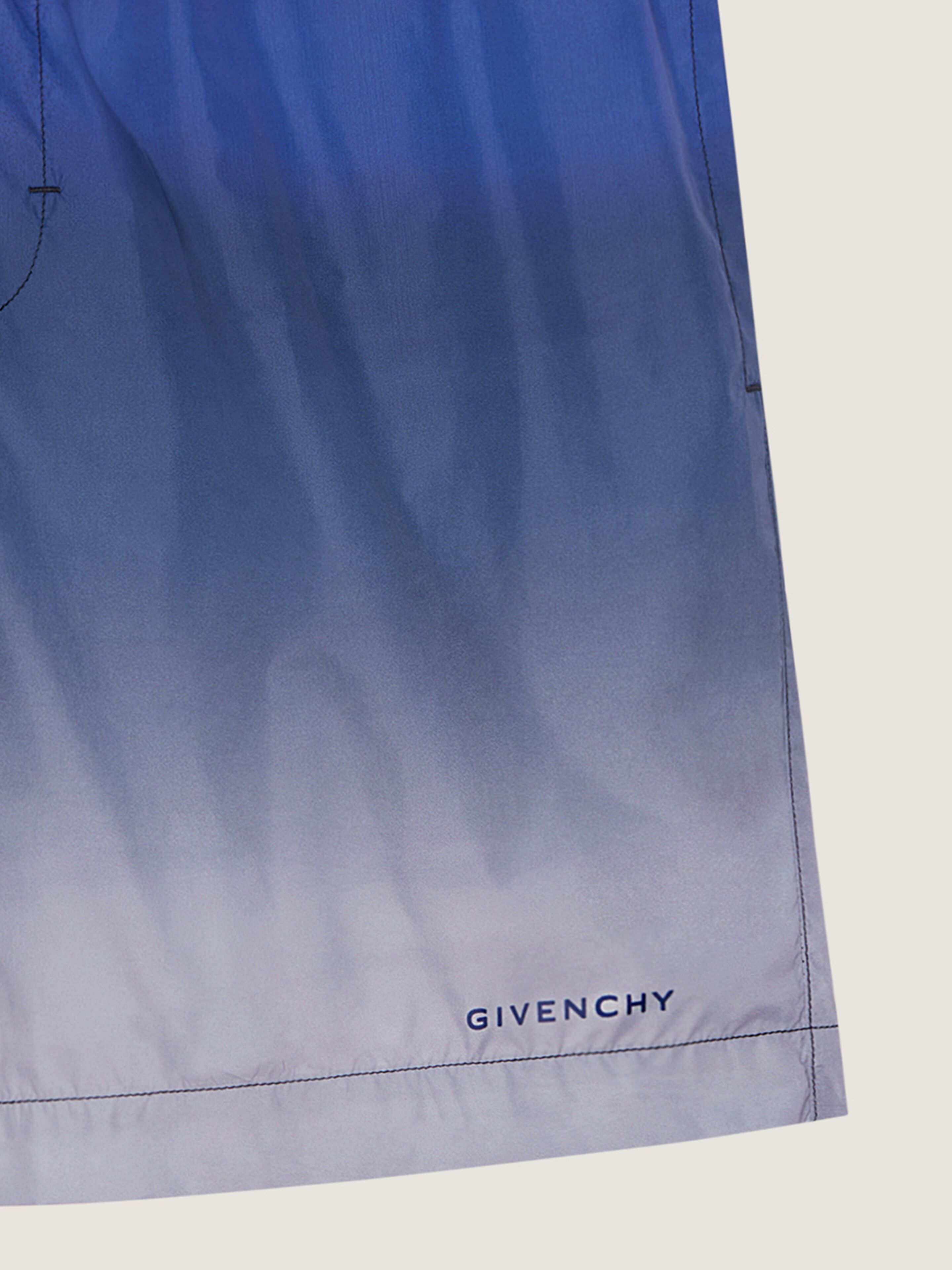 Swim shorts with gradient print